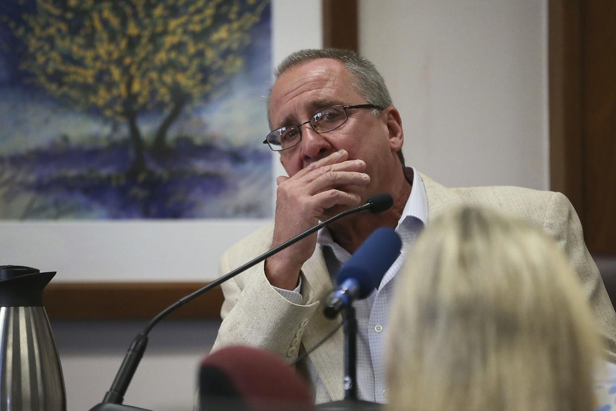 Neil Heslin, father of 6-year-old Sandy Hook shooting victim Jesse Lewis, becomes emotional during his testimony during the trial for Alex Jones on Aug. 2, 2022, at the Travis County Courthouse in Austin, Texas. 