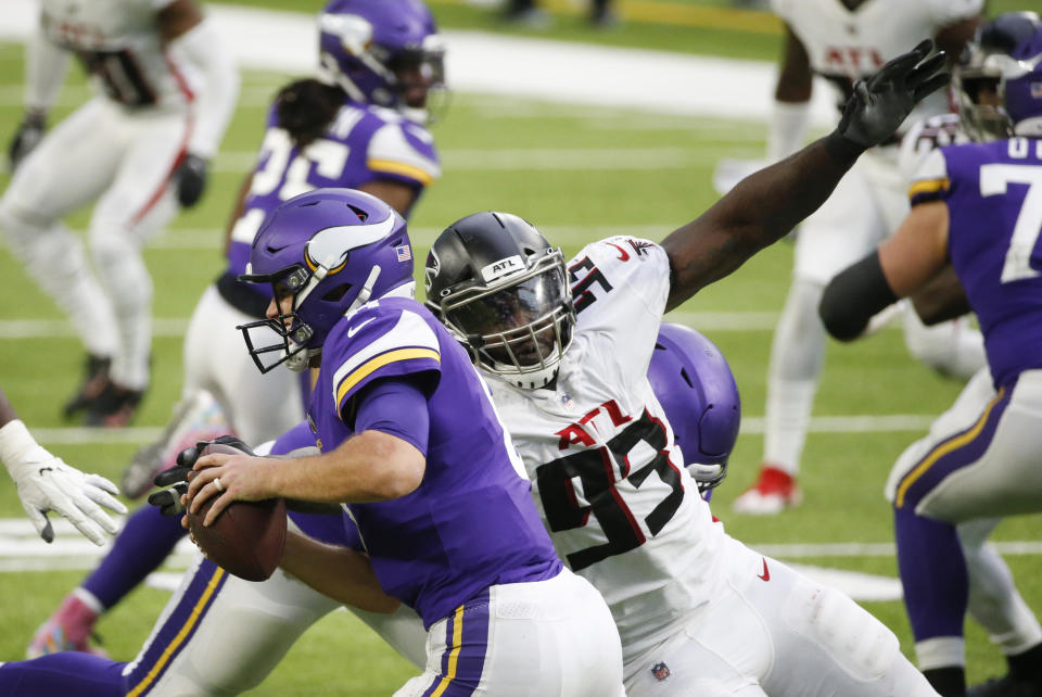 Atlanta Falcons defensive end Allen Bailey (93) sacks Minnesota Vikings quarterback Kirk Cousins during the second half of an NFL football game, Sunday, Oct. 18, 2020, in Minneapolis. (AP Photo/Bruce Kluckhohn)