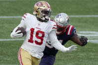 San Francisco 49ers wide receiver Deebo Samuel (19) runs from New England Patriots linebacker Ja'Whaun Bentley after catching a pass in the first half of an NFL football game, Sunday, Oct. 25, 2020, in Foxborough, Mass. (AP Photo/Steven Senne)