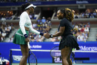 Serena Williams, right, and Venus Williams, of the United States, celebrate during their first-round doubles match against Lucie Hradecká and Linda Nosková, of the Czech Republic, at the U.S. Open tennis championships, Thursday, Sept. 1, 2022, in New York. (AP Photo/Frank Franklin II)