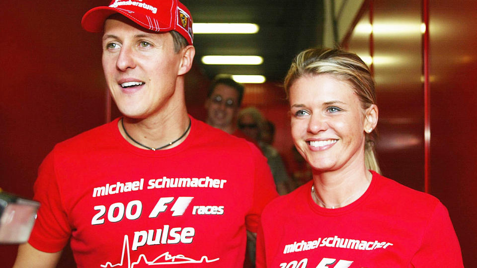 Michael Schumacher, pictured here wife Corrina at the Spanish F1 Grand Prix in 2004. 
