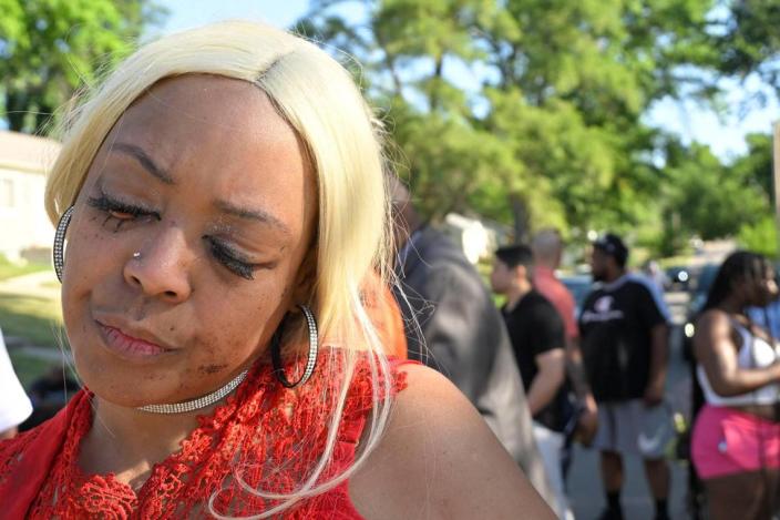 Nikkia Manning still had blood on her face after giving her son, Nikko Manning, 22, CPR following a shooting early Sunday, June 25, 2023, near 57th Street and Prospect Avenue in Kansas City. Manning’s son was one of three people who died from the shooting. “He was just in the wrong place at the wrong time,” Nikkia Manning said. “It happened so fast. I just can’t believe it.” Tammy Ljungblad/tljungblad@kcstar.com