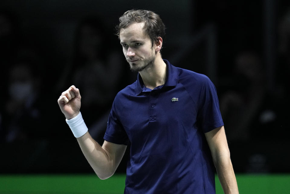 Russian Tennis Federation's Daniil Medvedev celebrates after beating Croatia's Marin Cilic to win the Davis Cup tennis final at the Madrid Arena in Madrid, Spain, Sunday, Dec. 5, 2021. (AP Photo/Bernat Armangue)