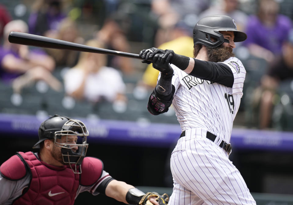 Colorado Rockies' Charlie Blackmon grounds out against Arizona Diamondbacks starting pitcher Madison Bumgarner in the first inning of a baseball game Saturday, May 22, 2021, in Denver. (AP Photo/David Zalubowski)