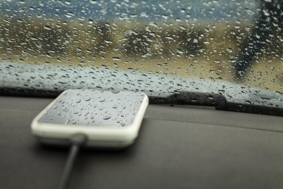 Cell phone is charging in the car (Getty)