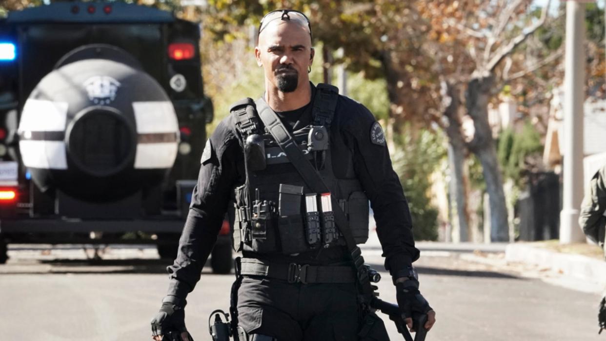  Shemar Moore walking toward the camera in SWAT gear on S.W.A.T. 