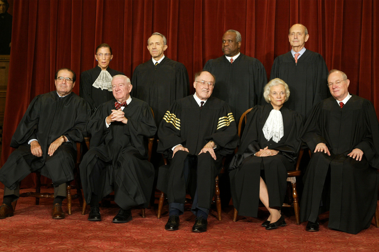 Antonin Scalia and Ruth Bader Ginsburg with other Supreme Court members