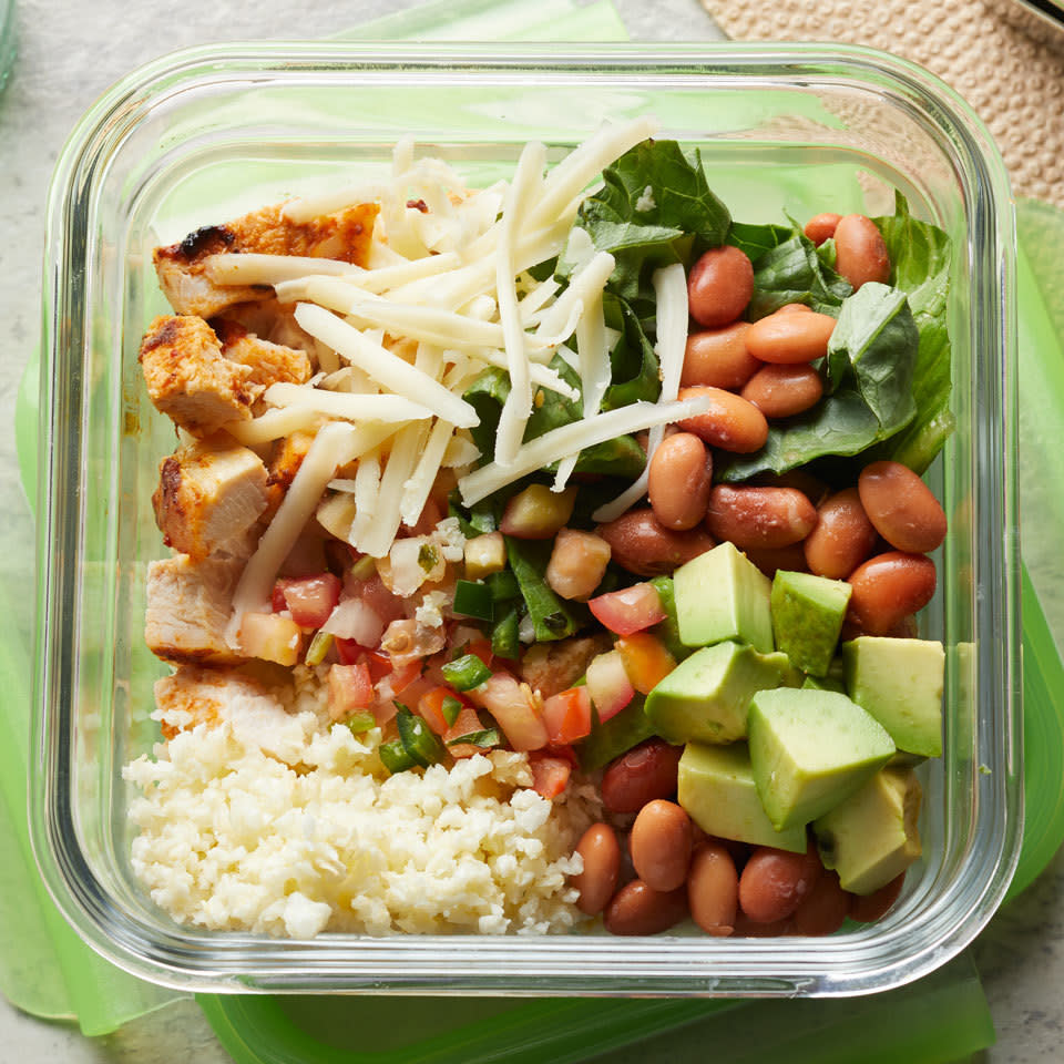 <p>This easy-to-make and meal-prep burrito bowl is even better than takeout! You'll never miss the carbs in this protein-packed, super-flavorful meal that replaces the cilantro-lime rice with cauliflower rice. We love this with chicken but it would be just as delicious with shrimp. <a href="https://www.eatingwell.com/recipe/261761/chipotle-chicken-burrito-bowl-with-cauliflower-rice/" rel="nofollow noopener" target="_blank" data-ylk="slk:View Recipe;elm:context_link;itc:0;sec:content-canvas" class="link ">View Recipe</a></p>