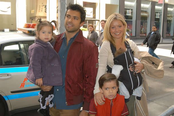 PHOTO: Kelly Ripa and husband Mark Consuelos with their children Michael, Lola and baby Joaquin in New York, April 13, 2003. (Robin Platzer/FilmMagic via Getty Images)