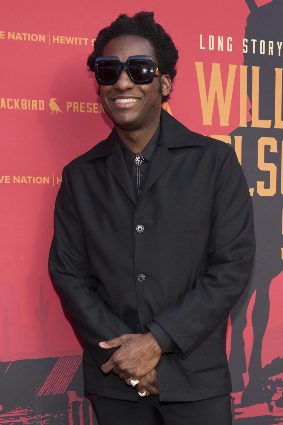 Leon Bridges arrives at Willie Nelson 90, celebrating the singer's 90th birthday, on Saturday, April 29, 2023, at the Hollywood Bowl in Los Angeles. (Photo by Allison Dinner/Invision/AP)