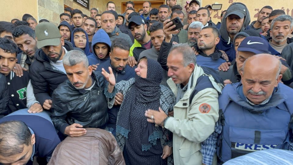 Friends and relatives attended the funeral. - Bassam Masoud/Reuters
