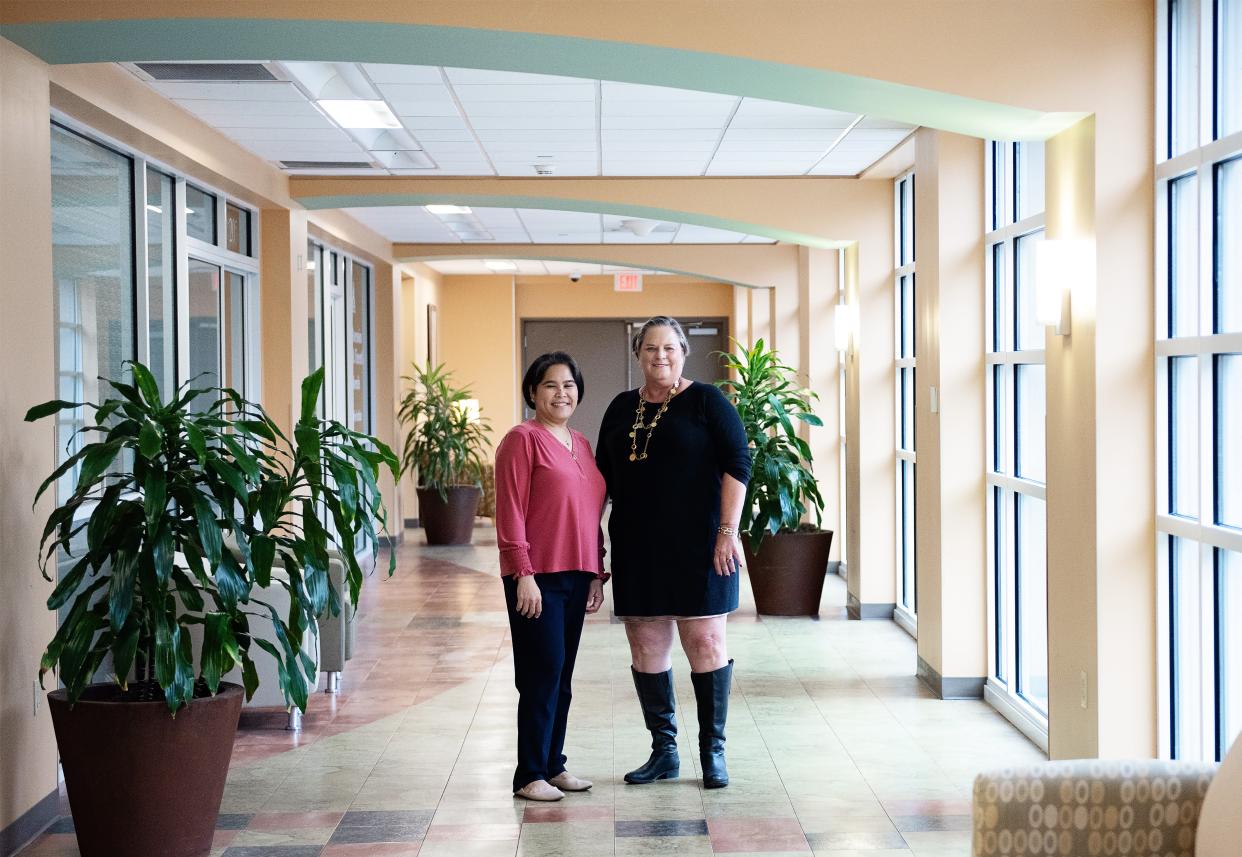 Registered nurse Ruby Soriano (left), manager of Ascension St. Vincent's Riverside's oncology support services program, poses in the hospital with Jacksonville philanthropist Andrea Laliberte, who provided the initial funding for the program.