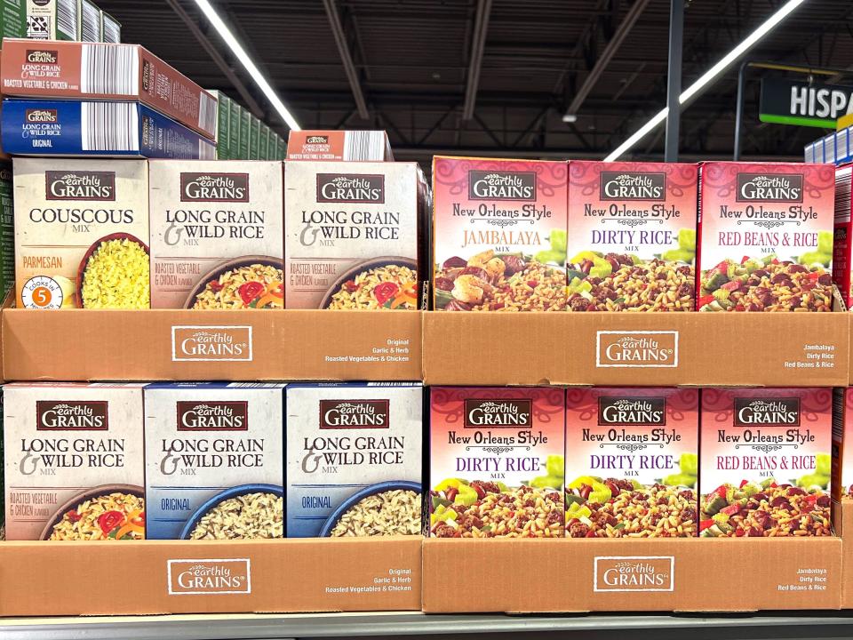 Boxes of Earthly Grains rice on a shelf at Aldi. 