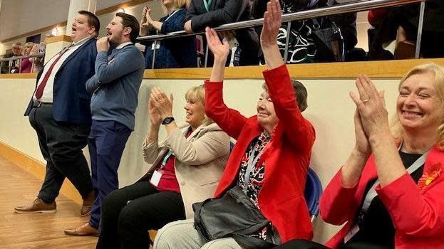 Cheering Labour supporters as the results are announced