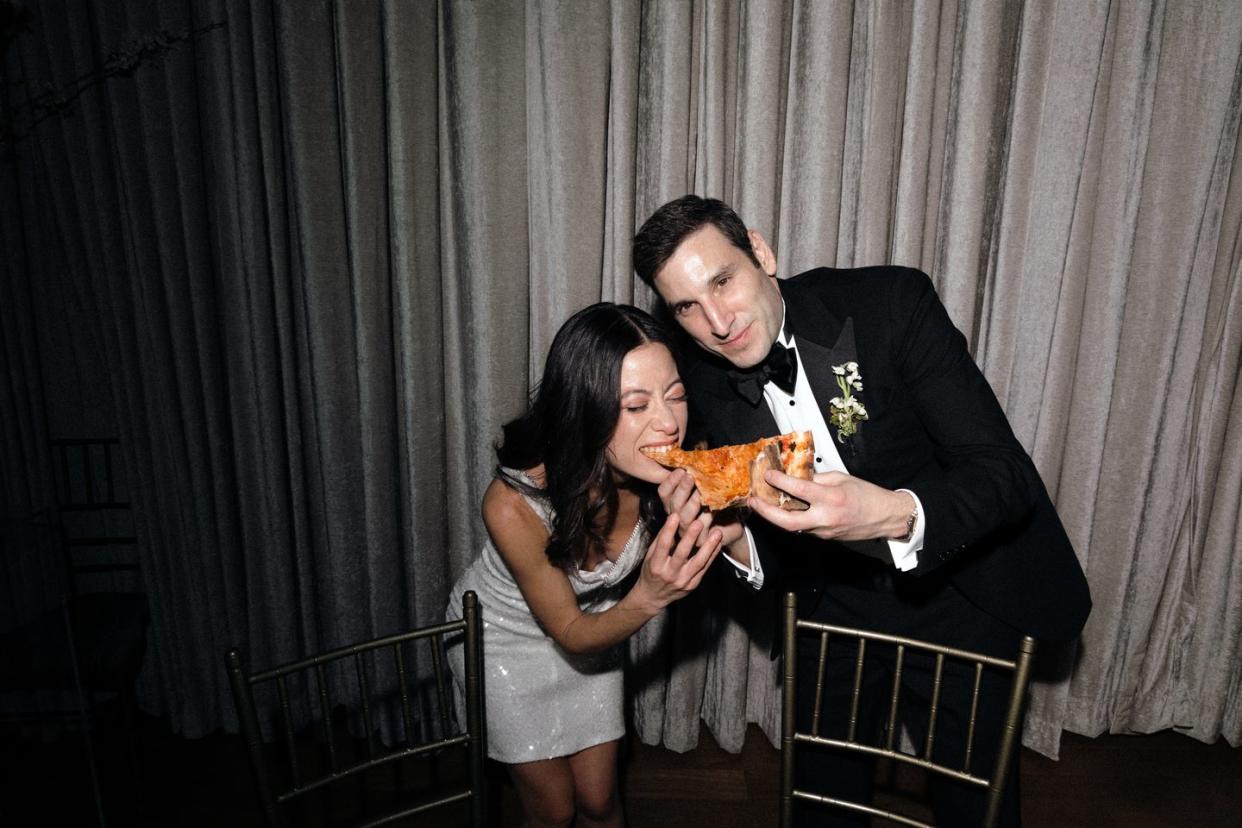 a man and woman eating food