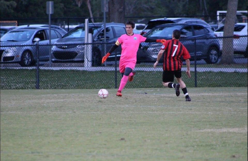 Lakeland United goalie Zac Coppin prepares to boot a ball in a game vs. the Orlando Rovers on April 30.