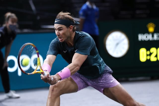 Rafael Nadal plays a backhand during his victory over Pablo Carreno Busta
