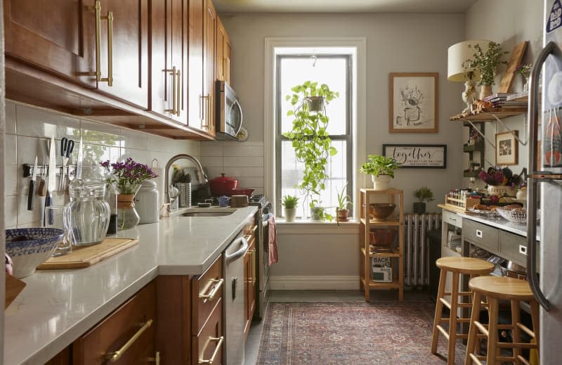 Galley kitchen with white countertops in Brooklyn kitchen.