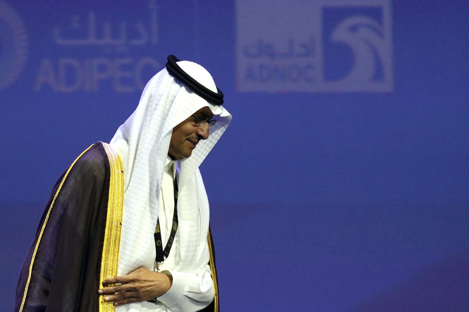 Saudi Arabia's Energy Minister Prince Abdulaziz bin Salman leave the podium after his speech at the Abu Dhabi International Petroleum Exhibition & Conference in Abu Dhabi, United Arab Emirates, Monday, Oct. 31, 2022. Saudi Arabia and the United Arab Emirates defended on Monday a decision by OPEC and its allies to cut oil production, even as an American envoy warned of "economic uncertainty" ahead for the world. (AP Photo/Kamran Jebreili)