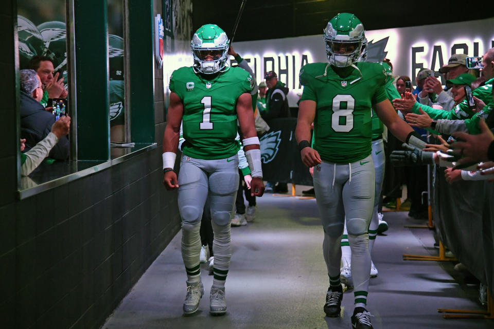 Oct 22, 2023; Philadelphia, Pennsylvania, USA; Philadelphia Eagles quarterback Jalen Hurts (1) and quarterback Marcus Mariota (8) in the tunnel before game against the Miami Dolphins at Lincoln Financial Field. Mandatory Credit: Eric Hartline-USA TODAY Sports