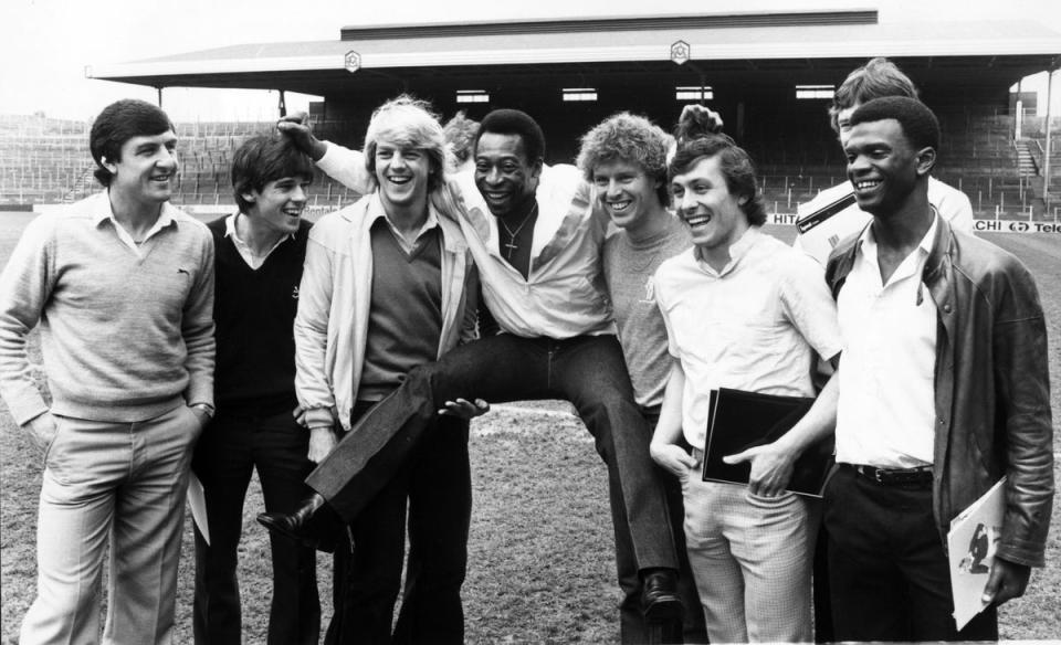 1st May 1981: Pele meets members of the Arsenal football team at Highbury. Arsenal had joined a sponsorship venture with Ingersoll Electronics, who held the exclusive UK franchise for the Atari Championship Soccer game, personally endorsed by Pele. (Getty Images)