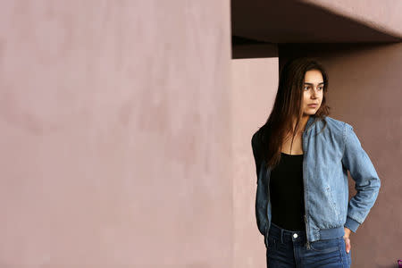 Former Biological Resource Center intern Emily Glynn, 24, poses for a portrait at the Arizona State University Art Museum in Tempe, Arizona, U.S., December 17, 2017. Picture taken December 17, 2017. REUTERS/Caitlin O'Hara