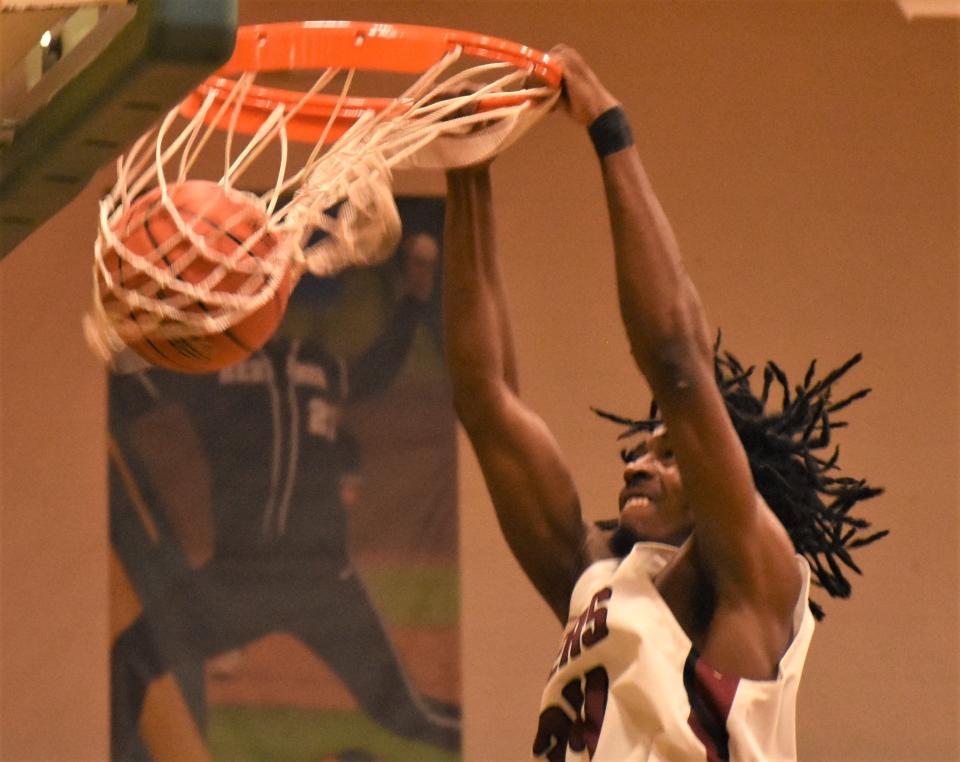 Sandhills Community College's Bryan Quiller dunks against Brookdale Community College during the second half of the NJCAA's Division III championship game.