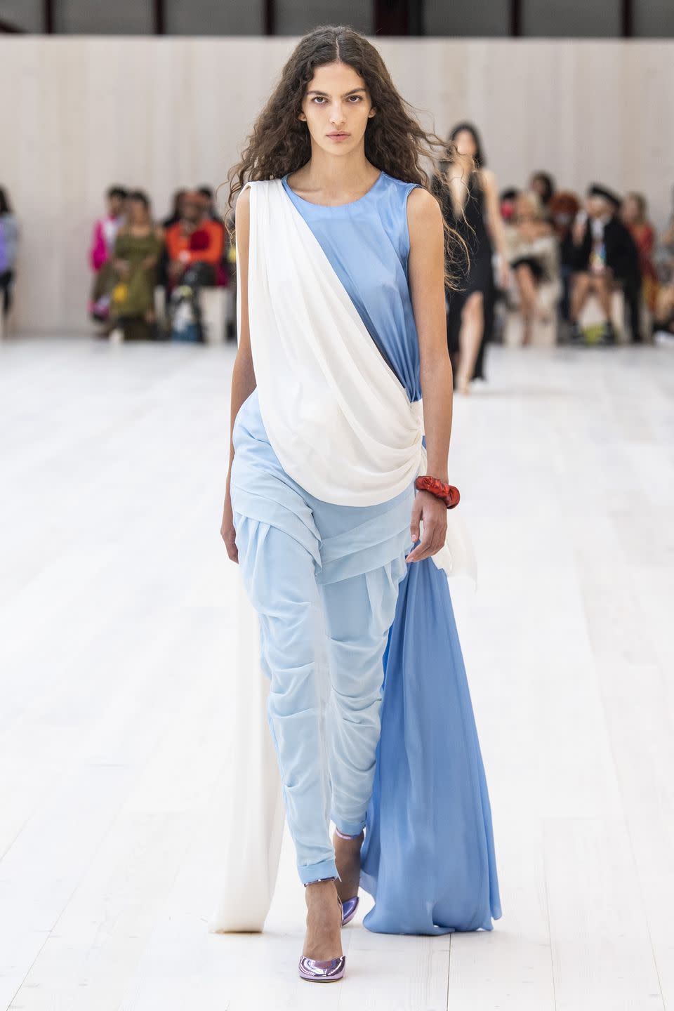 <p>Jonathan Anderson staged Loewe's spring/summer 2022 show at the equestrian arena of La Garde Républicaine, a historic location in the centre of Paris, where models emerged through the floor, from a hidden underground space. The collection – which was the first that had been presented through a catwalk show since the pandemic began – was described by the house as "a renaissance".</p><p>"The runway returns with an unabashed outburst of experimentation—where provocation, sensuality and movement mark a definitive point of departure."</p>