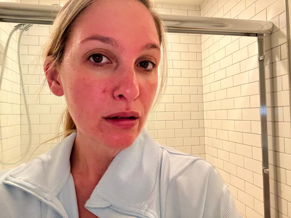 jen posing for a selfie after washing the clinique moisturizer off her face 