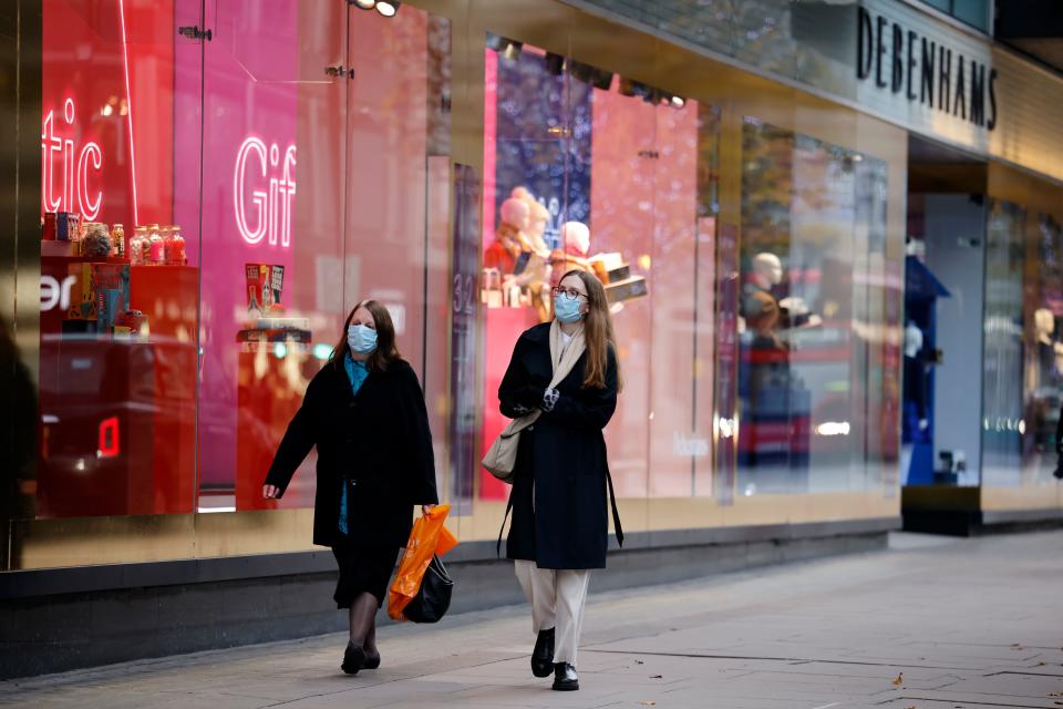 Shoppers on a deserted Oxford Street in London. Photo: Tolga Akmen/AFP via Getty Images