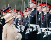 <p>Her Majesty smiles proudly at Prince Harry during the Sovereign's Parade at Sandhurst Military Academy. </p>