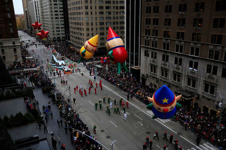 Macy's Elf balloons float above 6th Avenue during the 90th Macy's Thanksgiving Day Parade in the Manhattan borough of New York, U.S. November 24, 2016. REUTERS/Saul Martinez