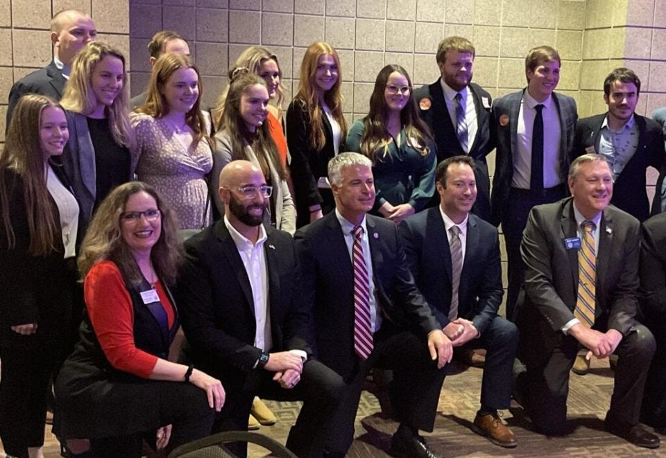 Marty Jackley (front row, center) takes a photo with College Republicans from South Dakota State University at the Lincoln Day Dinner in Brookings.