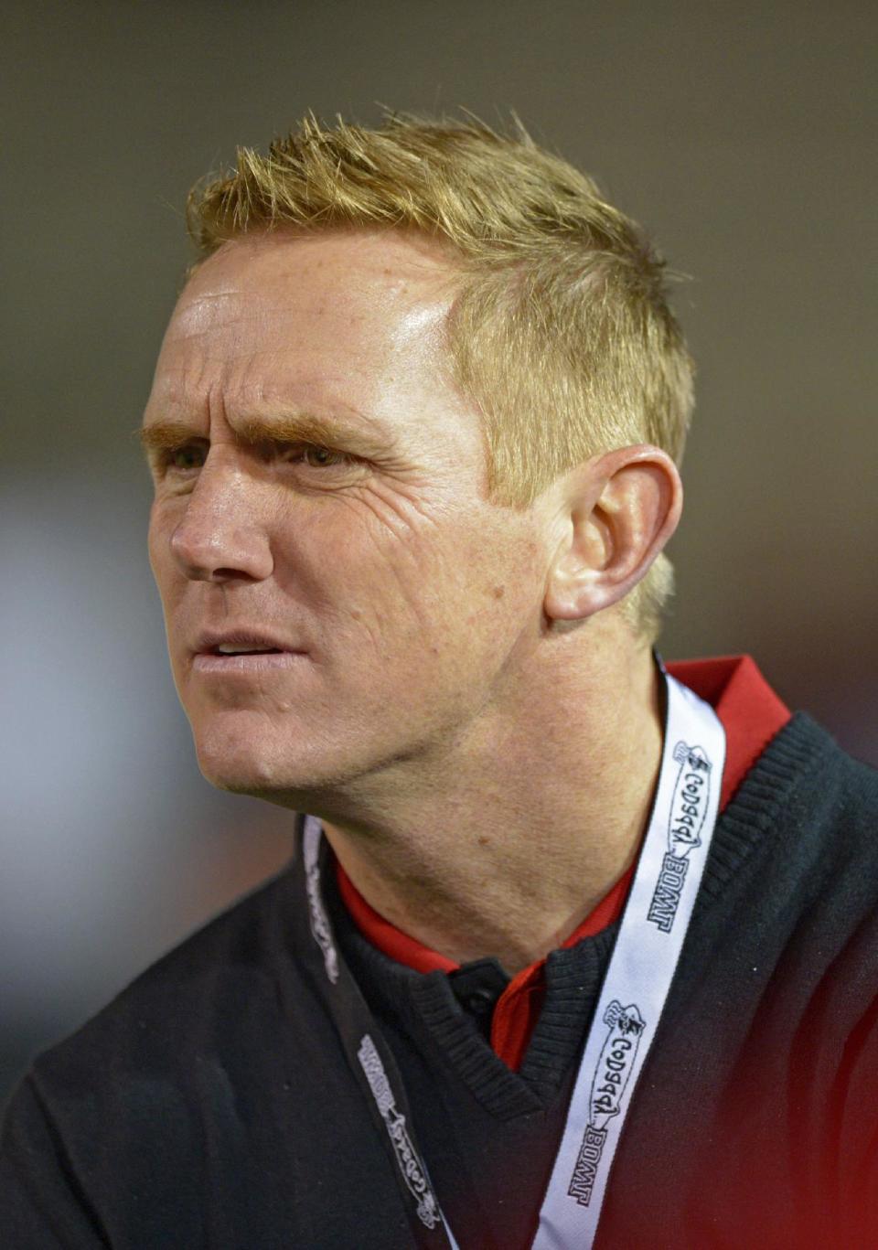 Newly-named Arkansas State head coach Blake Anderson watches as the Red Wolves take on Ball State in the first quarter of the GoDaddy Bowl NCAA college football game Sunday, Jan. 5, 2014, in Mobile, Ala. Anderson will succeed interim head coach John Thompson, who is coach the team in the bowl game. (AP Photo/G.M. Andrews)