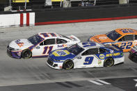 Denny Hamlin (11) drives followed by Chase Elliott (9) and Joey Logano (22) during a NASCAR Cup Series auto race at Bristol Motor Speedway Sunday, May 31, 2020, in Bristol, Tenn. (AP Photo/Mark Humphrey)