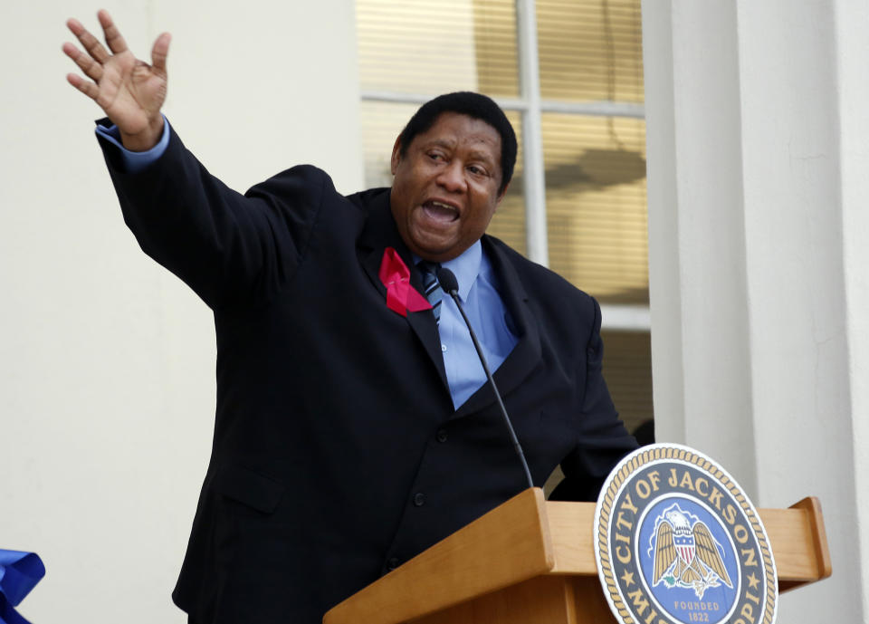 FILE - Hinds County Supervisor Kenneth Stokes praises the accomplishments of the late Jackson Mayor Chokwe Lumumba during the Hour of Remembrance, a memorial service for his father, March 7, 2014, at City Hall in Jackson, Miss. Amid backlash over the fatal shooting of a Mississippi man on Sunday, Sept. 25, 2022, the state’s top law enforcement official said police officers in the capital city of Jackson will not change the way they pursue suspects. (AP Photo/Rogelio V. Solis, File)