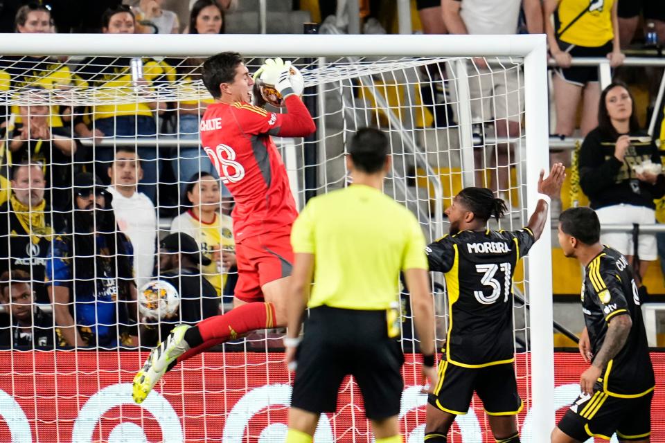 Sep 20, 2023; Columbus, Ohio, USA; Columbus Crew goalkeeper Patrick Schulte (28) makes a save during the second half of the MLS soccer game against the Chicago Fire at Lower.com Field. The Crew won 3-0.