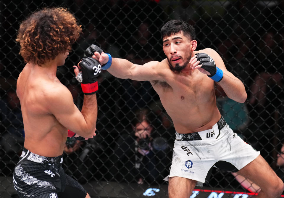 LAS VEGAS, NEVADA – NOVEMBER 18: (R-L) Nick Aguirre punches Payton Talbott in a bantamweight fight during the UFC Fight Night event at UFC APEX on November 18, 2023 in Las Vegas, Nevada. (Photo by Chris Unger/Zuffa LLC via Getty Images)