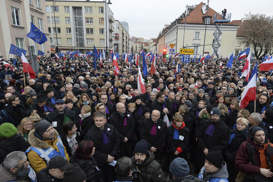 Judges and lawyers from across Europe, many of them dressed in their judicial robes, march silently in Warsaw, Poland, Saturday, Jan. 11, 2020. The rally was a show of solidarity with Polish judges, who are protesting a bill that would allow the government to fire judges whose rulings they don't like. The legislation has been denounced by the European Union and the United Nations. (AP Photo/Czarek Sokolowski)