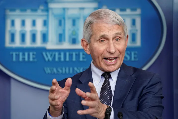 Dr. Anthony Fauci speaks in front of a White House seal.