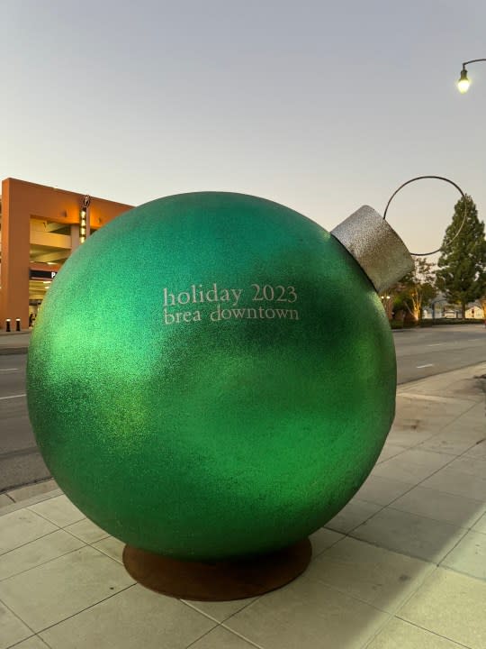 Oversized green ornament.