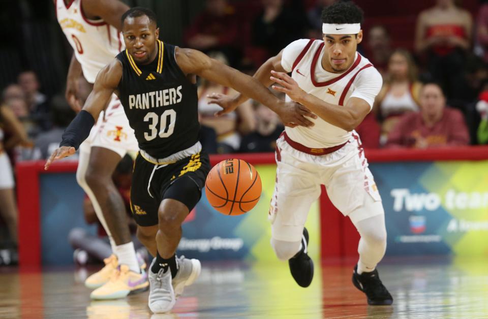 Iowa State's Tamin Lipsey, right, steals the ball from Prairie View A&M's Andre Nunley during Sunday's game at Hilton Coliseum. Lipsey set a new Cyclones single-game record with eight steals.