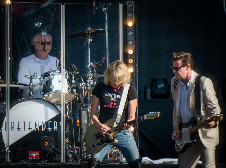Martin Wilkinson, Chrissie Hynde and James Walbourne of The Pretenders perform at Comerica Park in Detroit on July 13, 2018.