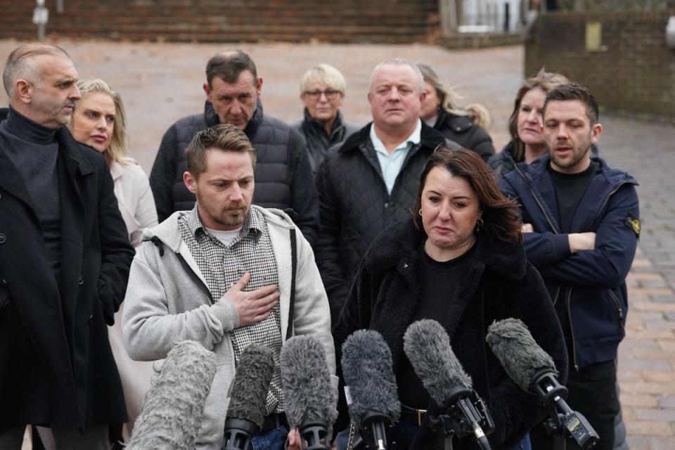 Sam Phillips, the father of Alfie Phillips, with his current partner Sarah Merritt, speaking outside Maidstone Crown Court in Kent (Gareth Fuller/PA Wire)