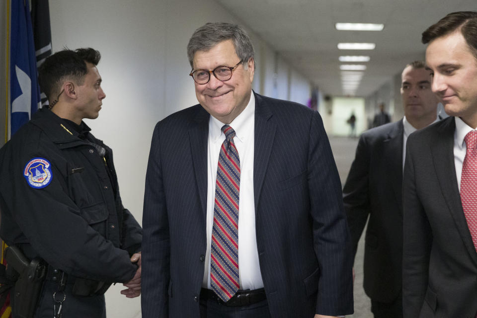 Attorney General nominee William Barr, center, arrives to meet with Sen. John Cornyn, R-Texas, on Capitol Hill, Wednesday, Jan. 9, 2019 in Washington. (AP Photo/Alex Brandon)