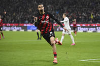 Frankfurt's Hugo Ekitike celebrates during the German Bundesliga soccer match between Eintracht Frankfurt and FC Augsburg, in Frankfurt, Germany, Friday, April 19, 2024. (Arne Dedert/dpa via AP)