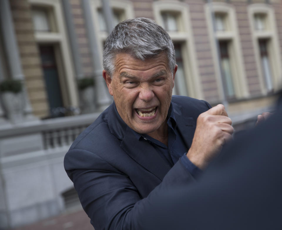 Self-styled Dutch positivity guru Emile Ratelband answers questions during an interview in Amsterdam, Netherlands, Monday, Dec. 3, 2018. A Dutch court has rejected the request of a self-styled positivity guru to shave 20 years off his age, in a case that drew worldwide attention. Emile Ratelband last month asked the court in Arnhem to formally change his date of birth to make him 49, instead of his real age of 69. He argued his request was consistent with other personal transformations, such as the ability to change one's name or gender. The Dutch court said age matters under Dutch law. (AP Photo/Peter Dejong)