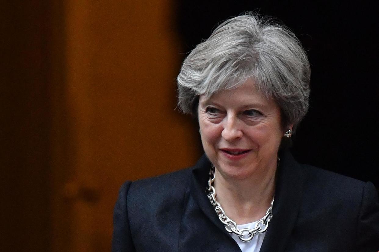 Theresa May 'slipped up' in this week's PMQs, appearing to say 'yes' to Jeremy Corbyn's suggestion to scrap universal credit: AFP