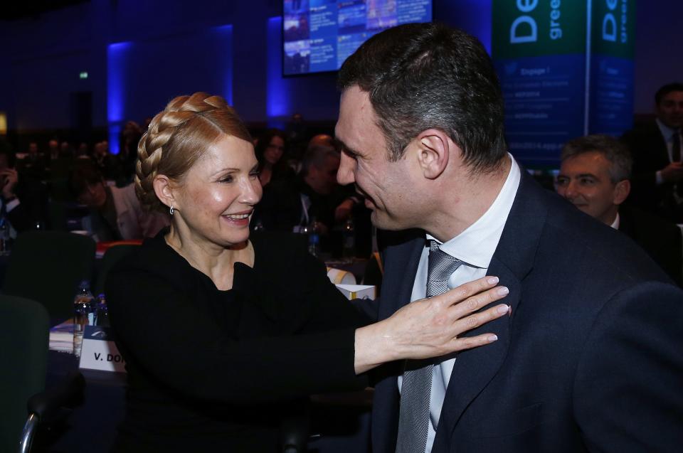 Ukrainian opposition politicians Yulia Tymoshenko and Vitaly Klitschko sit together at the European People's Party (EPP) Elections Congress in Dublin March 6, 2014. (REUTERS/Suzanne Plunkett)