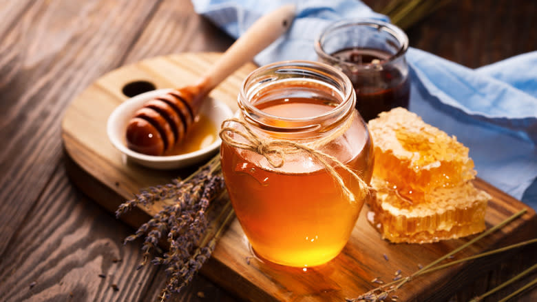 Jar of honey and honeycomb